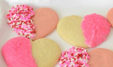 A Super Cute and Easy Valentine's Day Cookie, Great for School Parties or Just To Make the Occasion Special. Taste Yummy and Totally Adorable. Valentine's Day Cookies - White Chocolate Dipped Hearts
