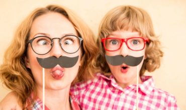 10 Ways to Be Silly and Laugh With Your Kids - Take Photos with Photo Props