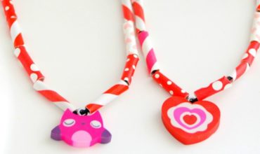 These Adorable Valentine's Day Necklaces are so super easy to make! A perfect Valentine's Day craft for a school party or make a great fine motor activity for littles.